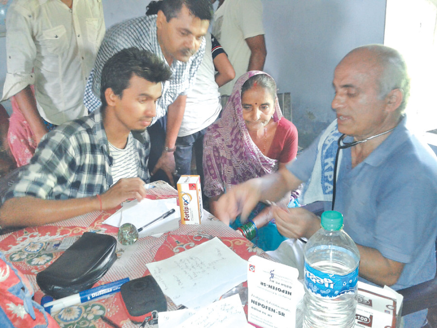 Dr KC leads medical team at flood-hit Saptari village to treat sick