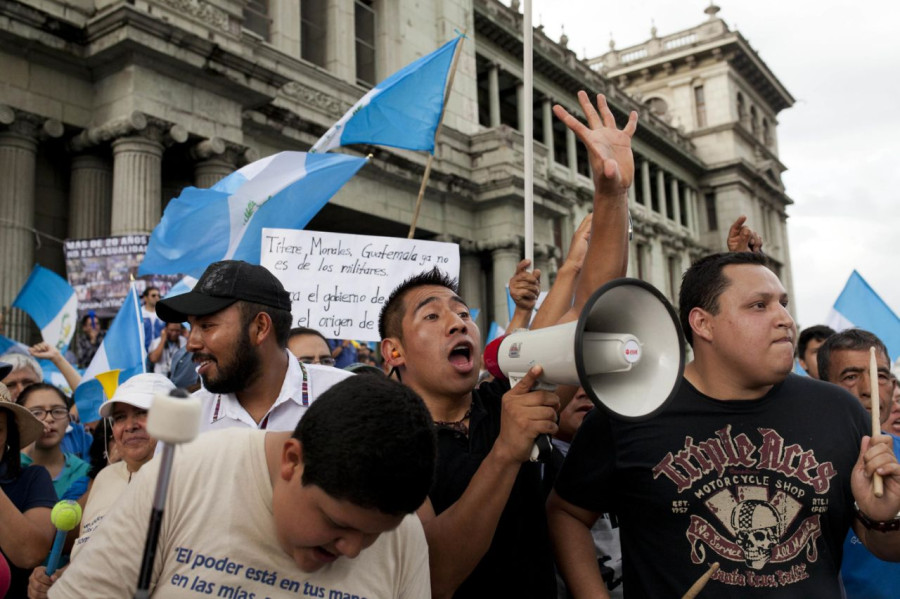 Guatemala arrests 3 ex-cabinet ministers, hunts for 2 more