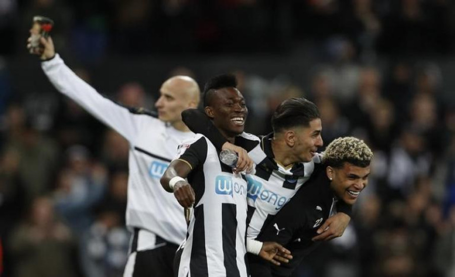 Four-goal Newcastle romp back to Premier League