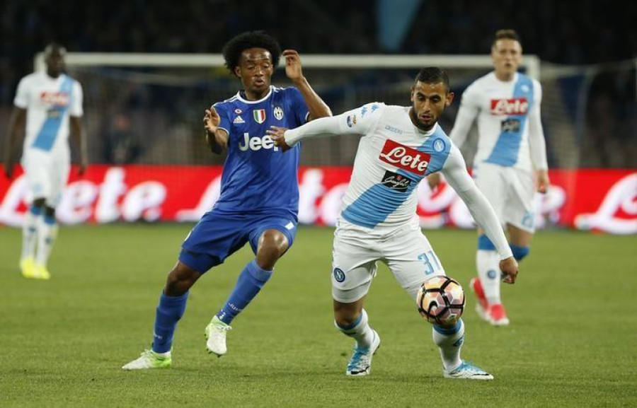 Juve hold out for tense draw at Napoli, Milan held