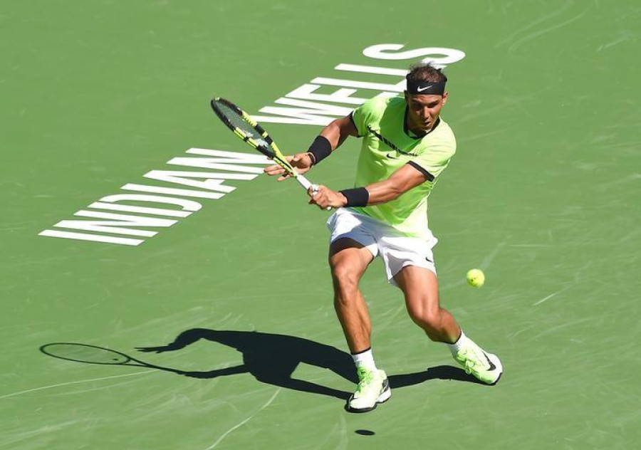 Federer, Nadal stay on course for desert showdown
