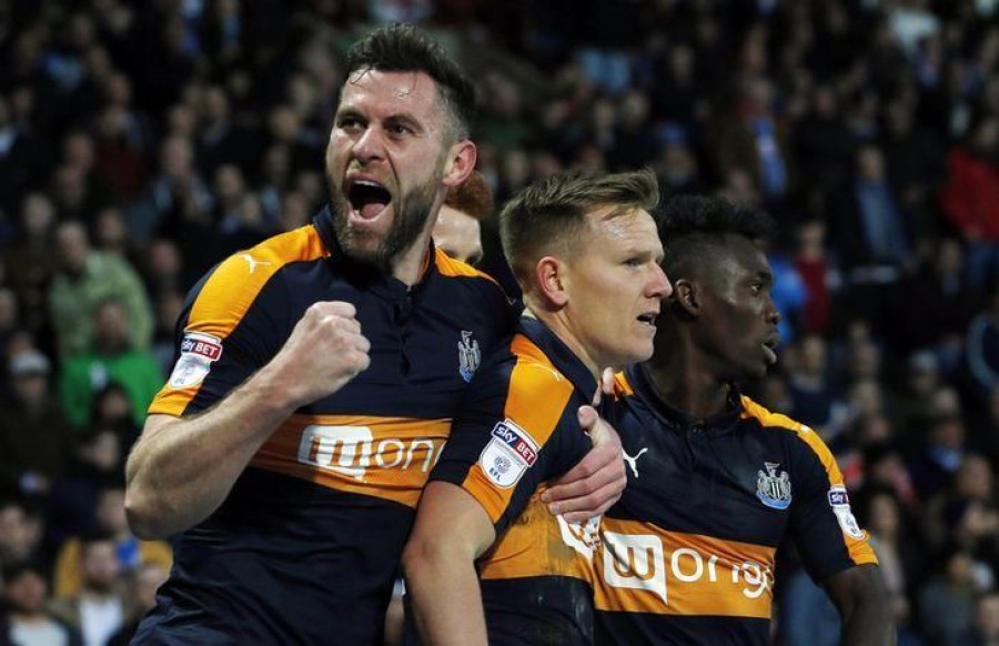 Newcastle extend Championship lead with victory at Huddersfield