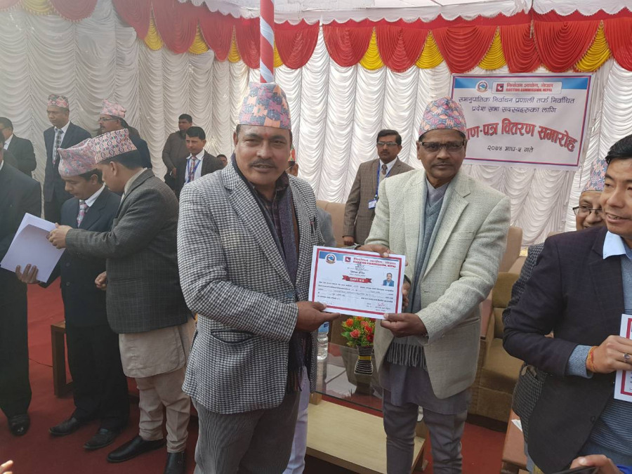 EC distributes certificates to provincial assembly PR winners (With photos)
