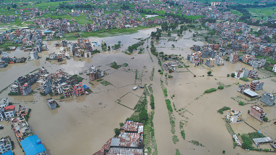 Flood victims help one another as they try to recover from disaster