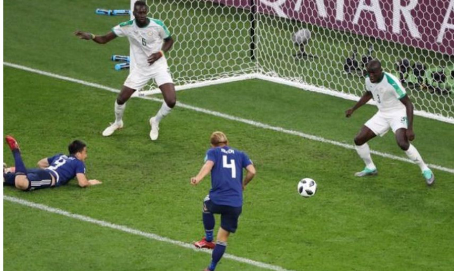 Honda salvages 2-2 draw for Japan against Senegal with late strike