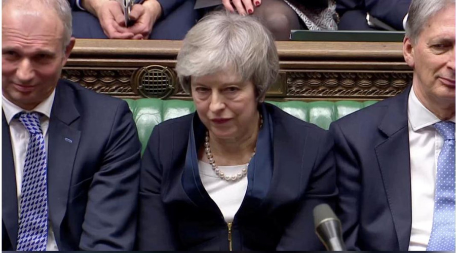 UK PM May faces confidence vote as Brexit goes down to the line