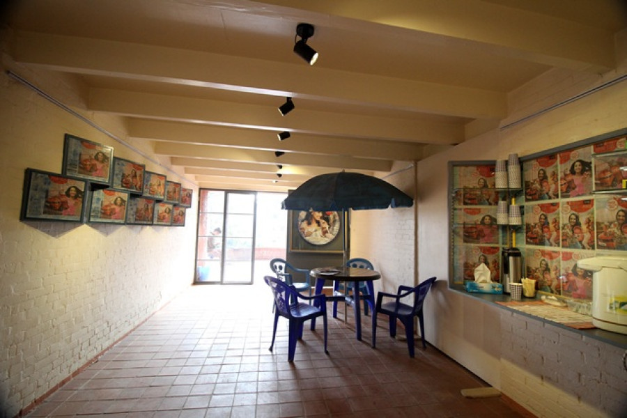 An artist recreates a khaja ghar inside a gallery, but there is no mention of food