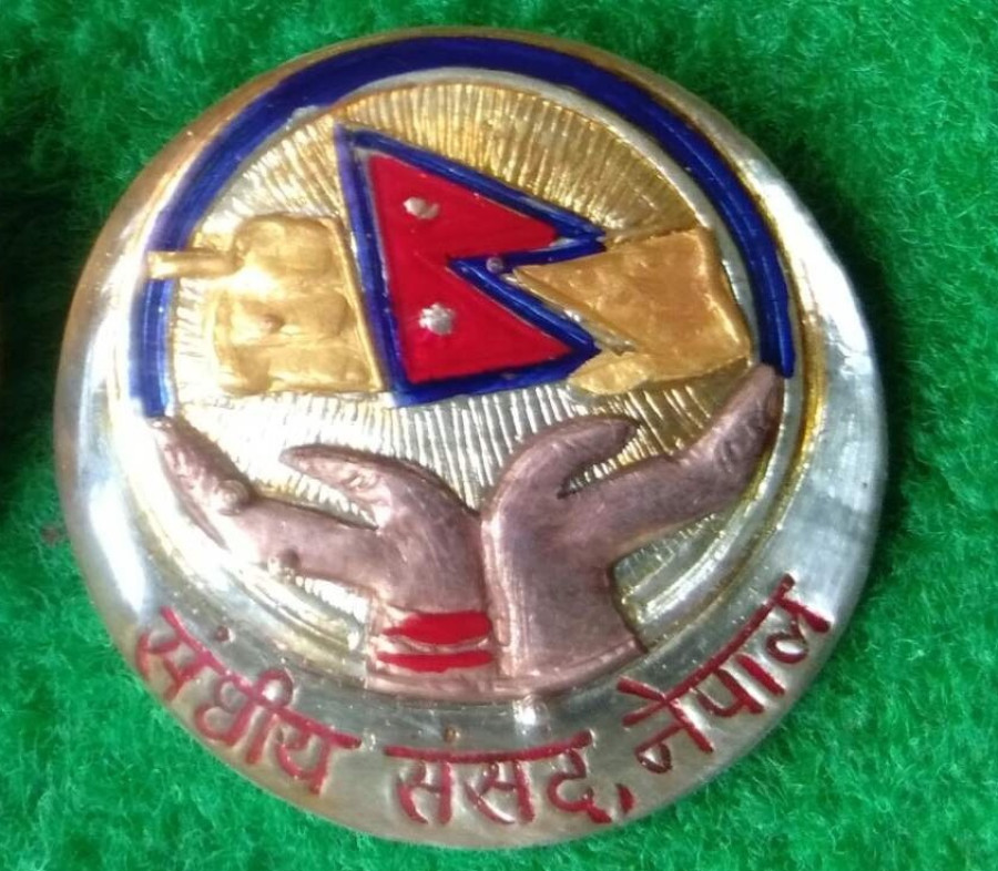 New badges made for lawmakers being returned to the manufacturer to fix the flaws