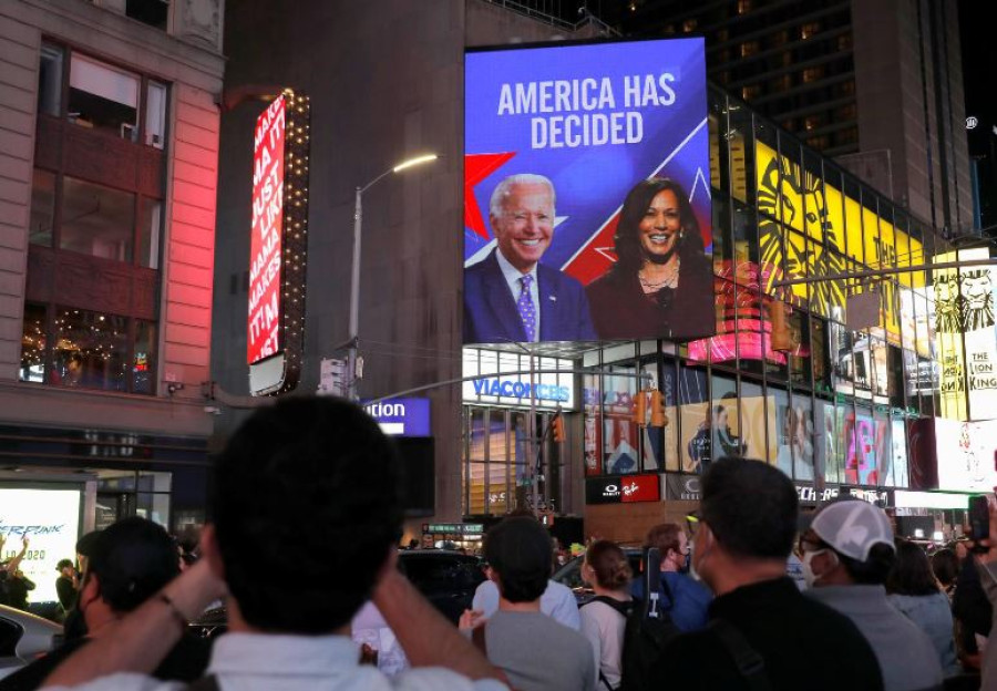 Biden wins US presidency, supporters celebrate in deeply divided nation