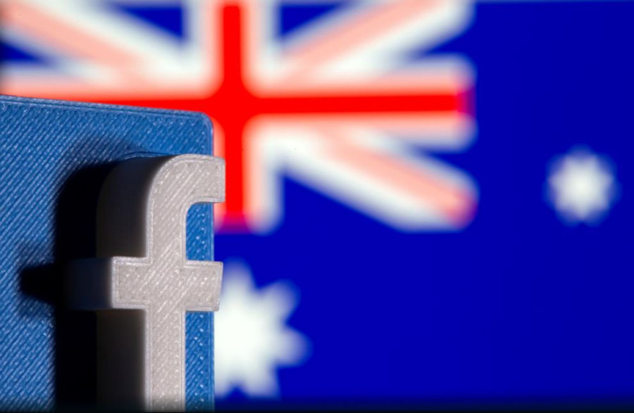 Undeterred by Facebook news blackout, Australia commits to content law