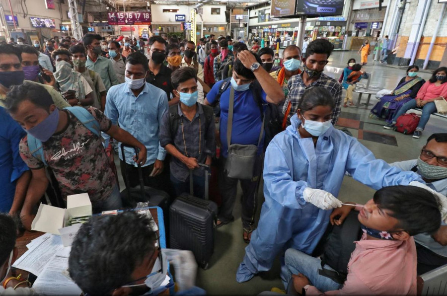 India's coronavirus cases peak over 12 million for first time
