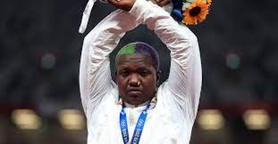 IOC says looking into gesture used by US athlete Saunders on podium