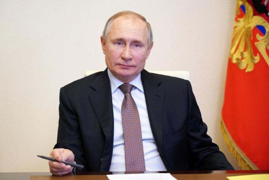 Putin signs law that could keep him in Kremlin until 2036