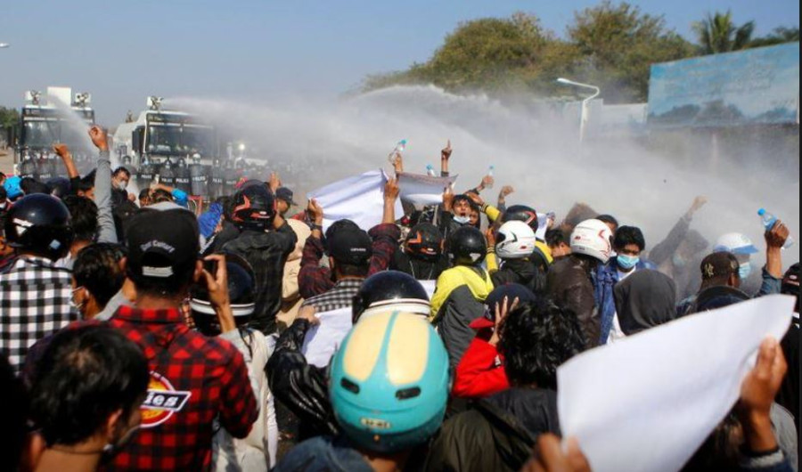 Myanmar police fire into air to disperse protest, three hurt by rubber bullets