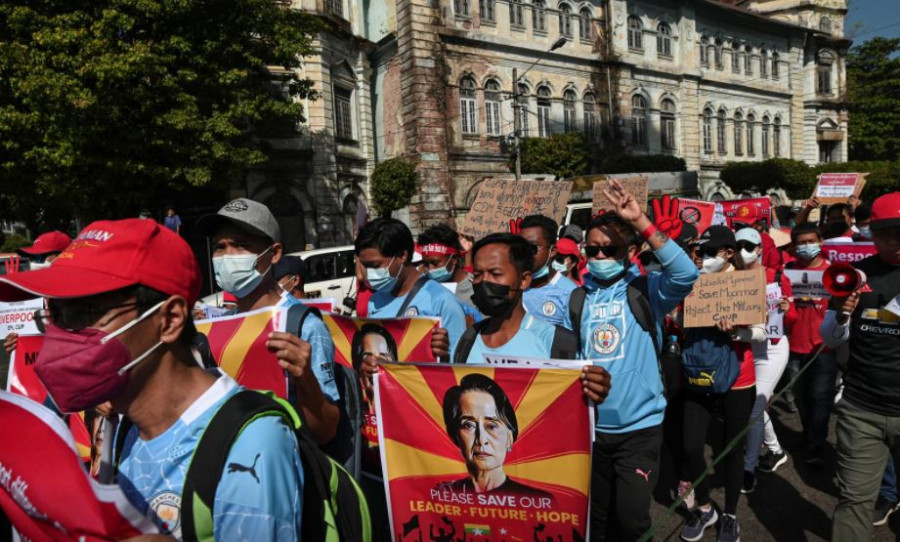 Three wounded as hundreds of thousands of protesters defy Myanmar junta