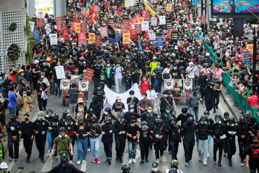 ‘No absolute monarchy’: Thousands of Thais march for royal reforms
