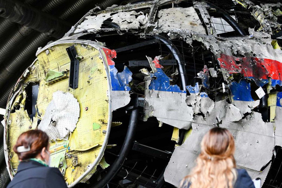Dutch court sentences three to life in prison for 2014 downing of MH17