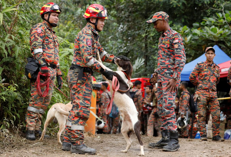 Search continues for nine campers caught in Malaysia landslide
