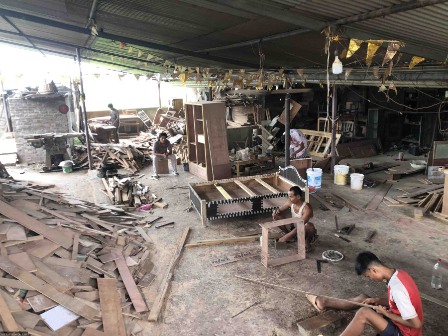 Nepali woodworkers suffer as Indian carpenters swamp market