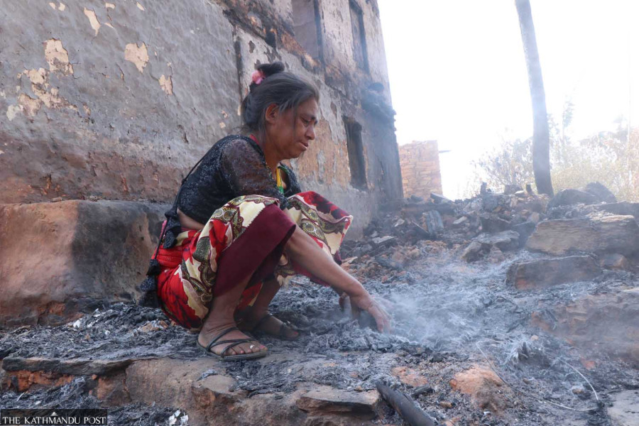 Fourteen houses burnt to a cinder by forest fire