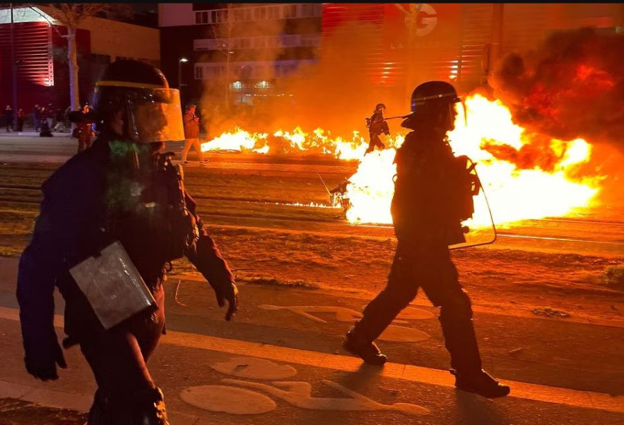 Paris police, protesters clash for third night over Macron’s pension reform