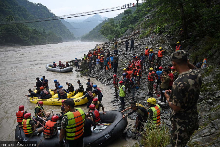 2 bodies found as search continues for missing buses