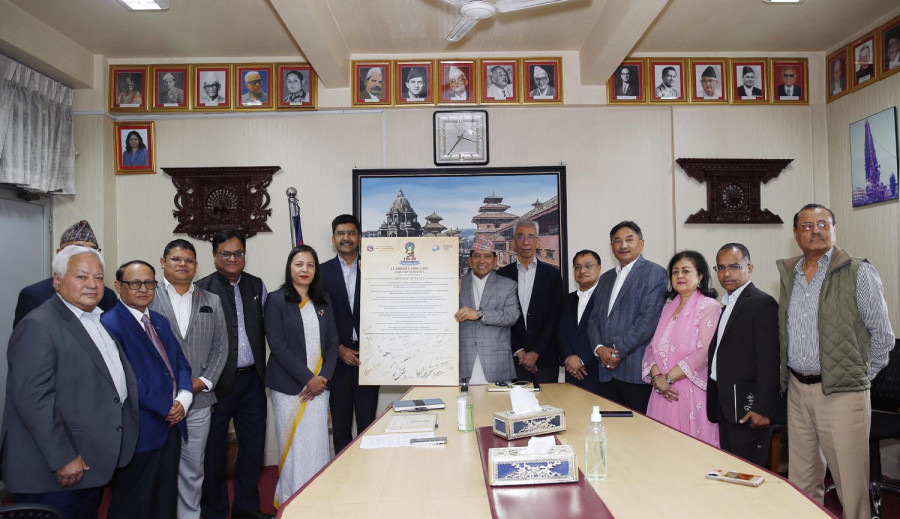 HCCN presents Lumbini Conclave’s message to Foreign Minister Shrestha.