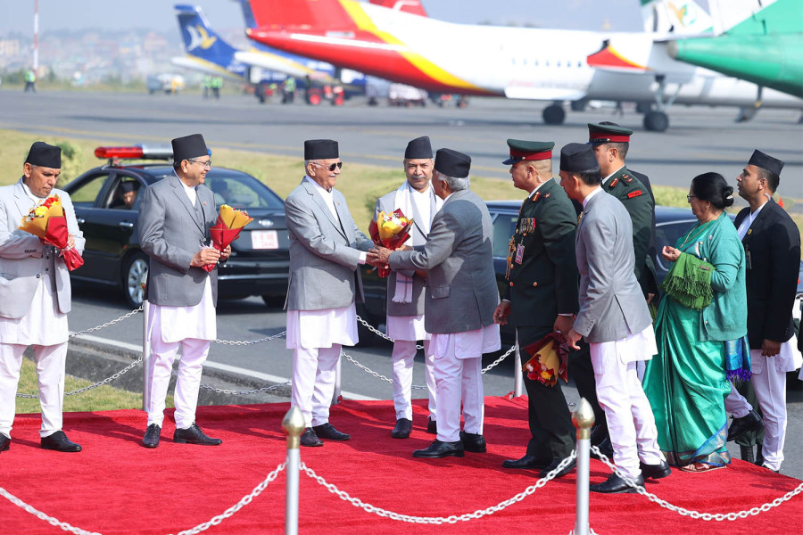 President returns home from Baku