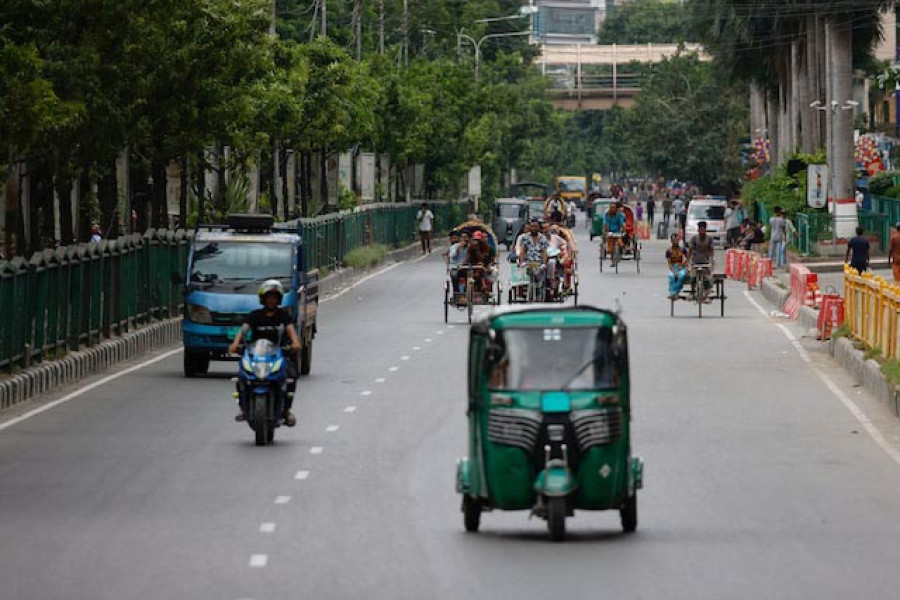Bangladesh factories, banks reopen as curfew is eased after protests taper off