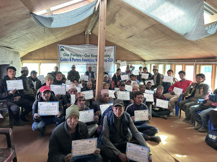 Porters keep tourists moving. But who looks after them?