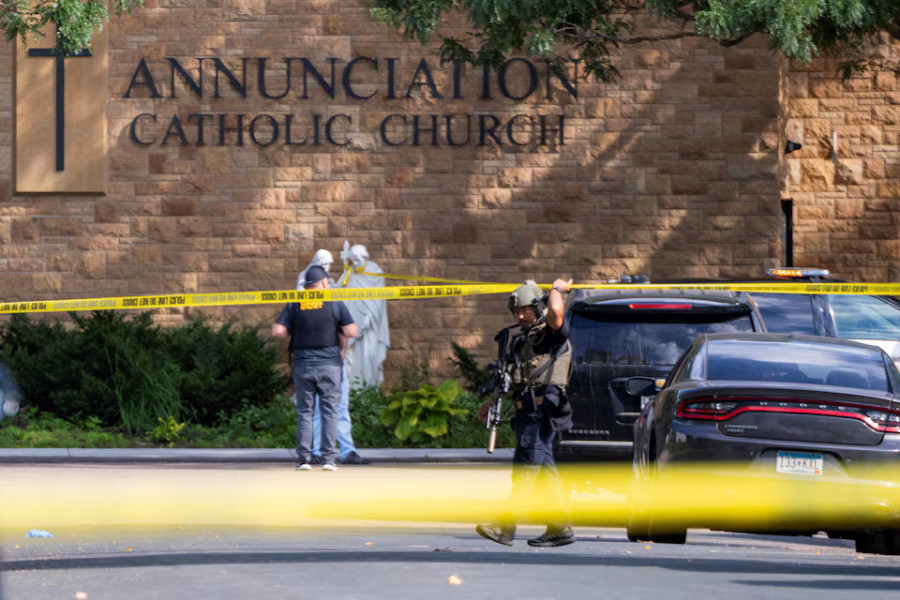 Shooter kills two Minneapolis school children in Catholic church, wounds 17 others