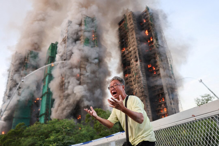 Four dead after fire engulfs residential high-rise buildings in Hong Kong