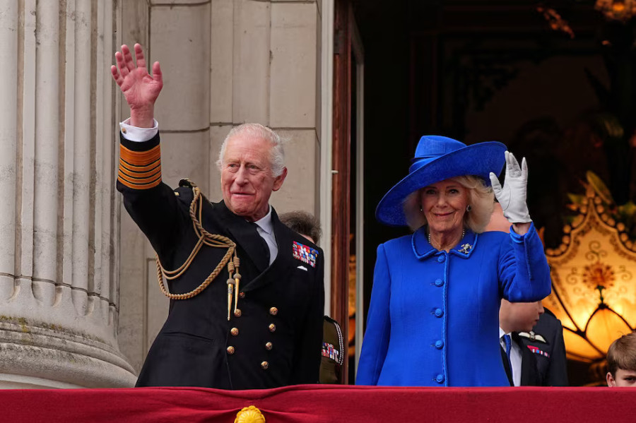 King Charles joins crowds for Victory in Europe Day celebrations