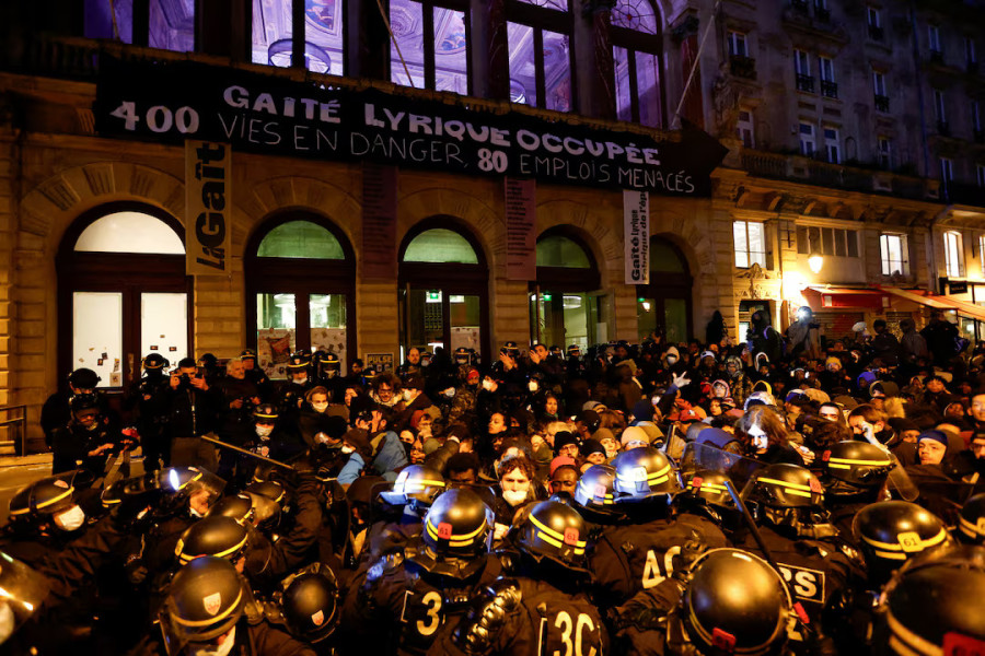 Police evict hundreds of migrants squatting in Paris theatre for months