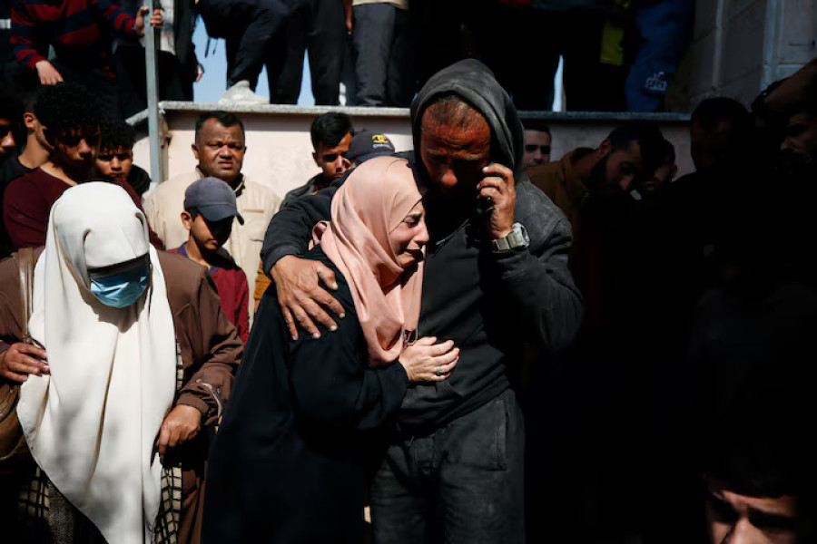 Israeli strikes kill 14 people in Gaza over past day, Palestinian medics say