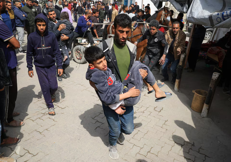 Israeli strike kills 29 people in Gaza City house, medics say