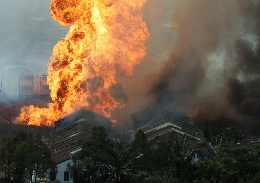 Towering blaze in Malaysia on Petronas pipeline, 63 sent to hospital