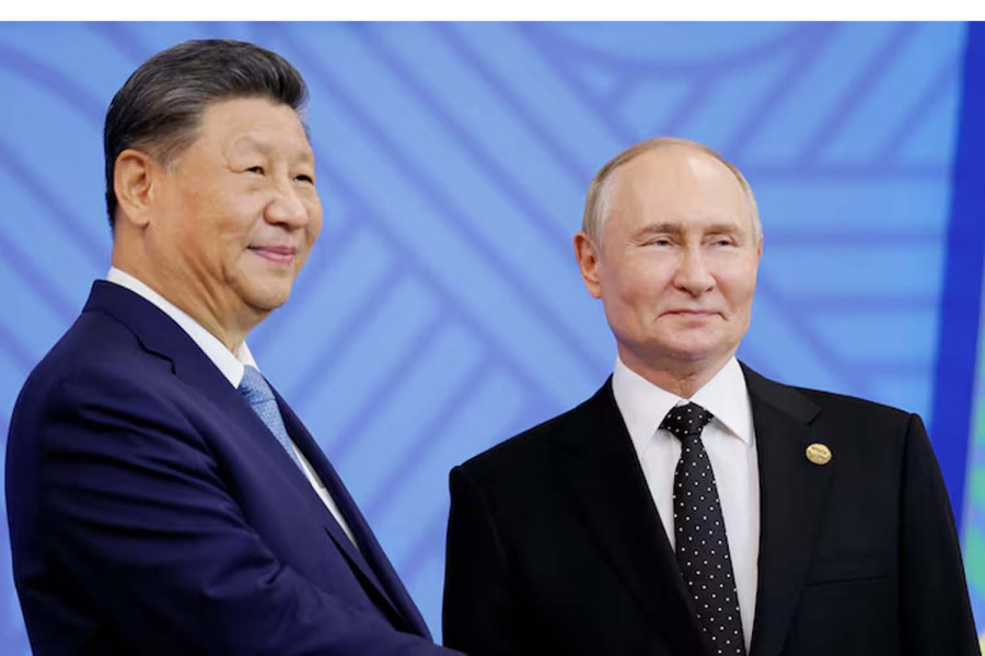 China and Russia should strengthen coordination in international affairs, Xi says