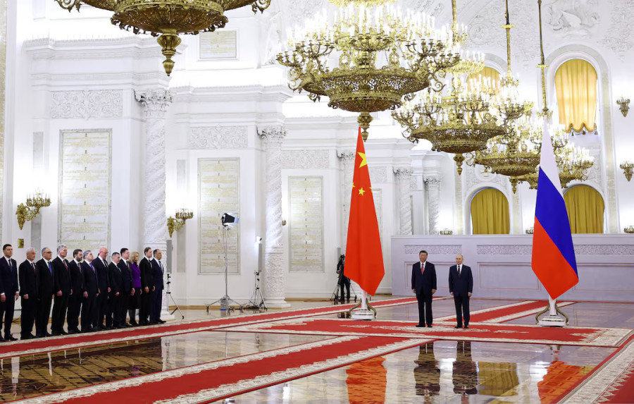 At Kremlin talks, Putin and Xi cast themselves as defenders of world order