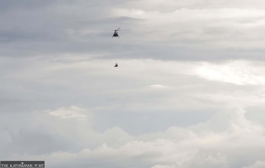 A helicopter finally reaches flood-isolated Tiru of Rasuwa, 15 days after the devastating deluge