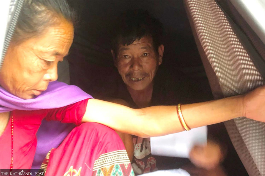 Flood took his home. His old citizenship photo is denying him relief