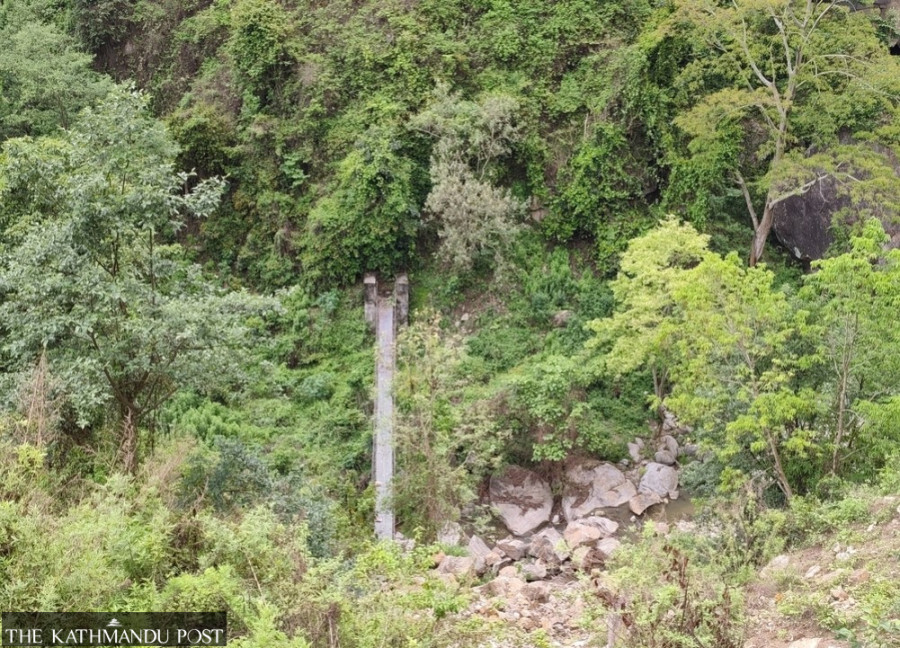 Suspension bridges lie unused in Dhankuta, travellers stop only for photos