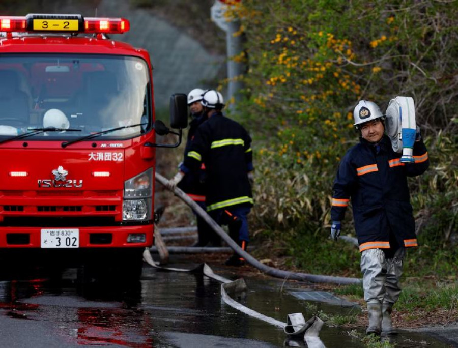 Tsunami survivor battles wildfire to protect hometown in Japan's northeast