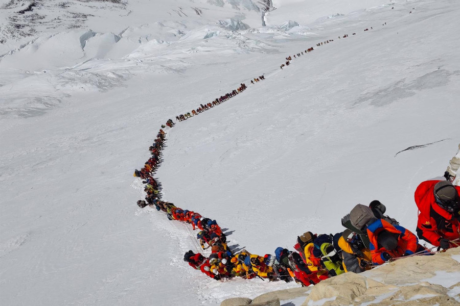 Everest crowding debate resurfaces after 270 climbers summit in a day