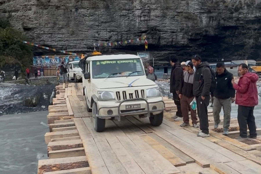 A timber bridge reopens route to Upper Manang after three weeks