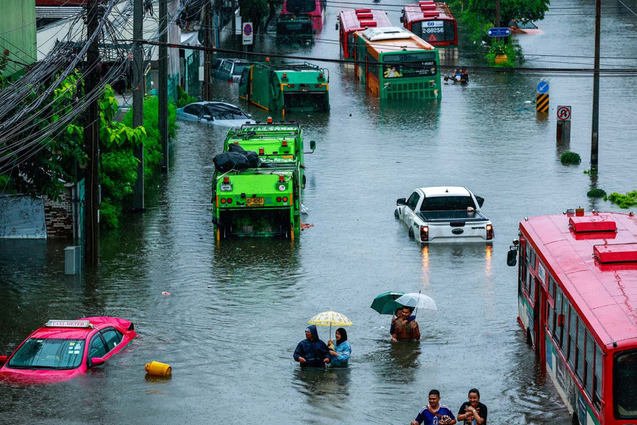 Bangkok floodwaters recede after torrential rain as residents count losses
