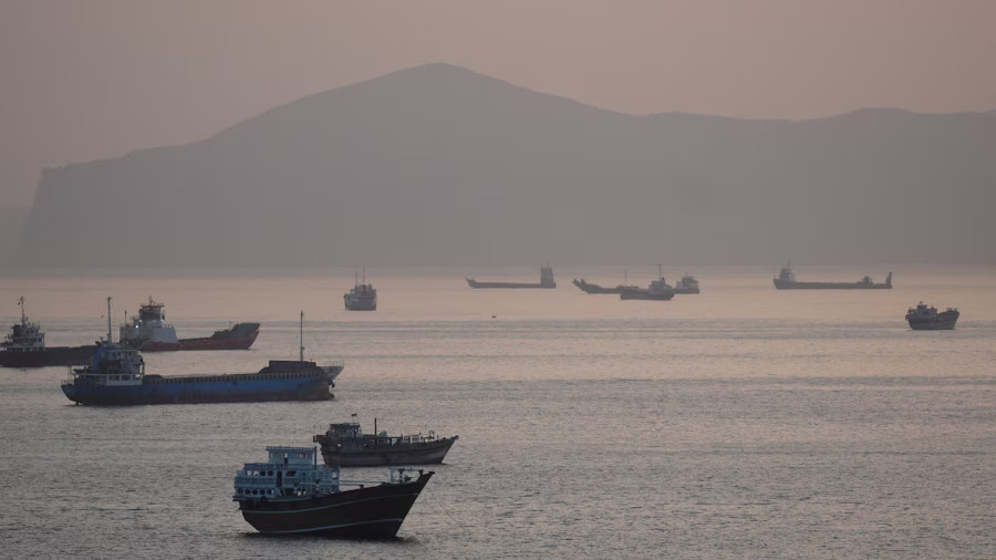 Iran says it forced US warship back from Strait of Hormuz, US denies missile strike
