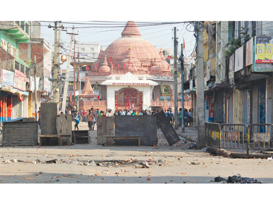 Protesters defy curfew