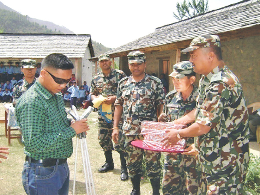 Visually-impaired man operates grinding mill to look after family