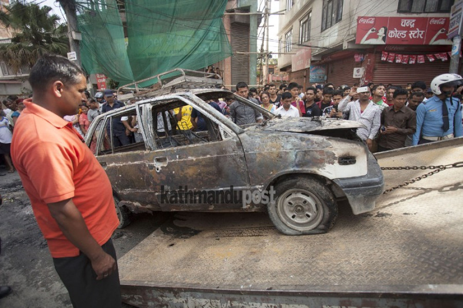 Banda enforcers torch Taxi in Sorhakhutte